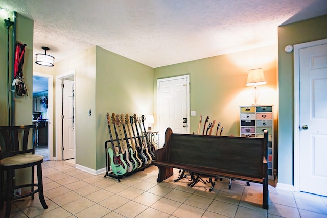 2014 Saddlebrook Dr, Murfreesboro, TN 37129 - sitting room featuring a textured ceiling and light tile patterned floors