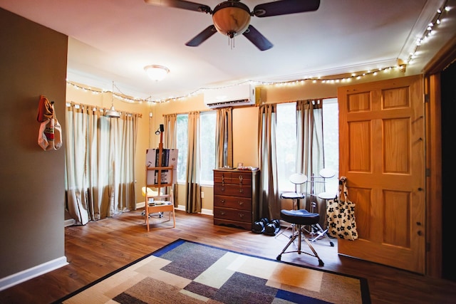 2014 Saddlebrook Dr, Murfreesboro, TN 37129 - living area with an AC wall unit, a ceiling fan, and wood finished floors