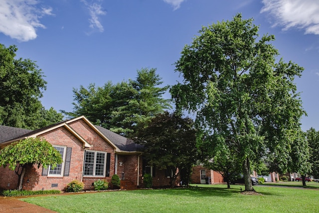 2014 Saddlebrook Dr, Murfreesboro, TN 37129 - view of front of house featuring brick siding and a front yard