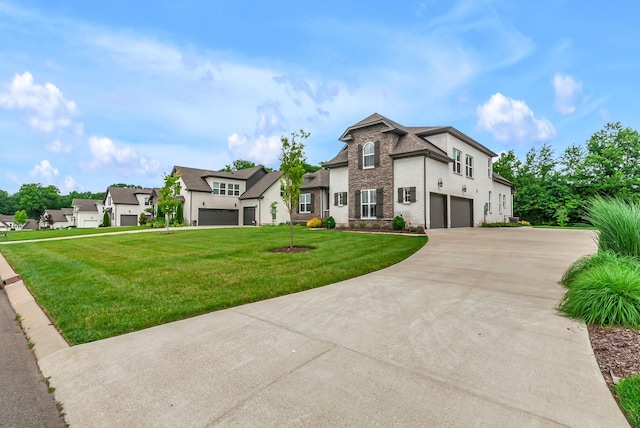 1132 Pretender Way, Columbia, TN 38401 - view of front of property with an attached garage, concrete driveway, a front yard, brick siding, and a residential view