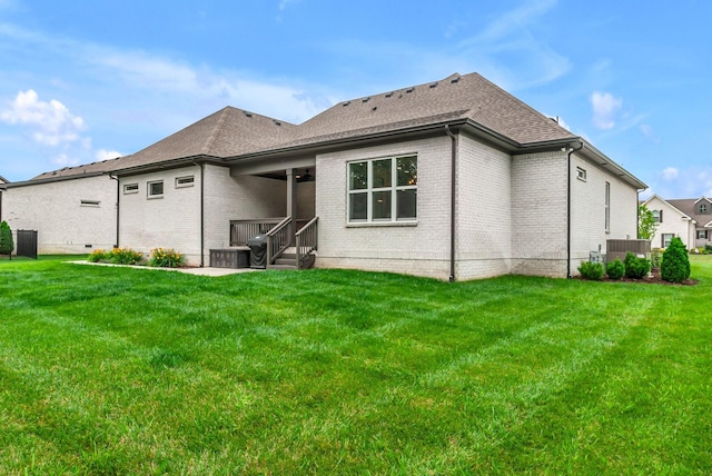 1132 Pretender Way, Columbia, TN 38401 - back of property with brick siding, a lawn, a shingled roof, and cooling unit
