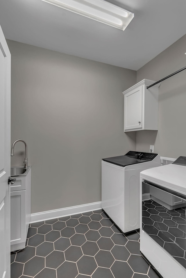 1132 Pretender Way, Columbia, TN 38401 - laundry room with cabinet space, washing machine and dryer, and baseboards