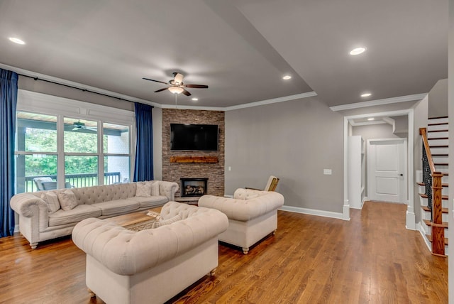 1132 Pretender Way, Columbia, TN 38401 - living room featuring ceiling fan, crown molding, a stone fireplace, baseboards, and stairway