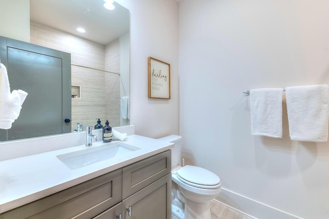 1106 Greenwood Ave, Nashville, TN 37206 - bathroom with vanity, toilet, and a shower
