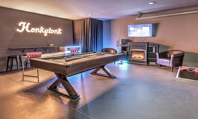 1106 Greenwood Ave, Nashville, TN 37206 - rec room with concrete flooring, a warm lit fireplace, billiards table, and recessed lighting