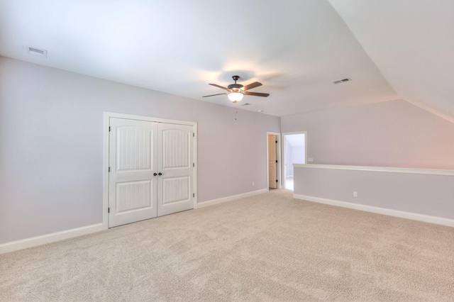 5502 Reflection Rd, Smyrna, TN 37167 - additional living space with ceiling fan, light carpet, baseboards, and vaulted ceiling