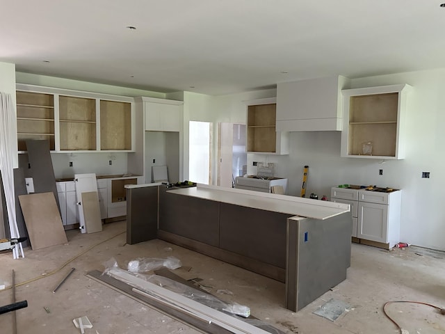 112 Stoneybrook Rd N, Columbia, TN 38401 - kitchen with a kitchen island, open shelves, and white cabinets