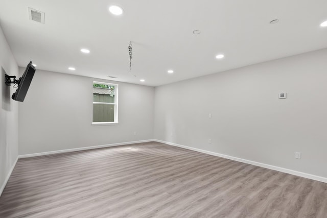 176 S Palmers Chapel Rd, White House, TN 37188 - empty room with light wood-style floors, recessed lighting, and baseboards