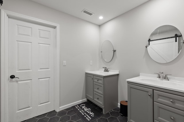 176 S Palmers Chapel Rd, White House, TN 37188 - bathroom with vanity, tile patterned floors, recessed lighting, and baseboards