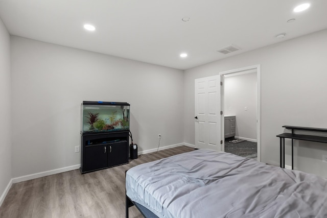 176 S Palmers Chapel Rd, White House, TN 37188 - bedroom with wood finished floors, baseboards, and recessed lighting