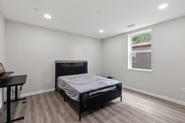 176 S Palmers Chapel Rd, White House, TN 37188 - bedroom with wood finished floors, recessed lighting, and baseboards