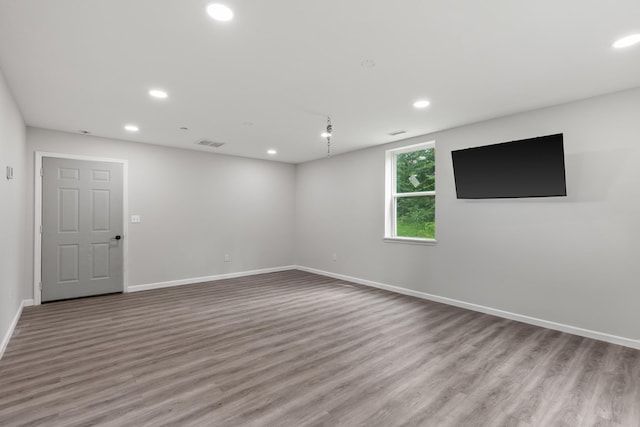 176 S Palmers Chapel Rd, White House, TN 37188 - empty room with wood finished floors, recessed lighting, and baseboards