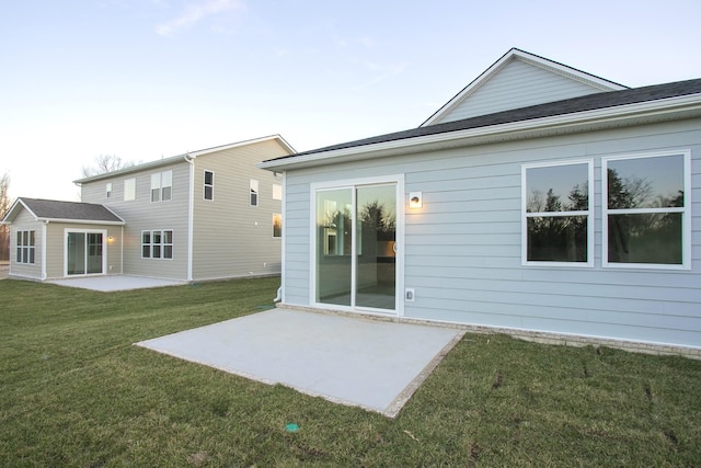 106 W Cassa Way, Mount Juliet, TN 37122 - back of house featuring a patio area and a lawn