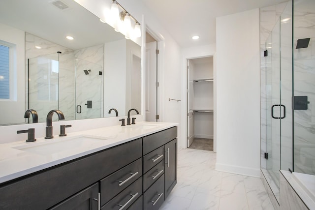 106 W Cassa Way, Mount Juliet, TN 37122 - full bathroom featuring marble finish floors, double vanity, a marble finish shower, baseboards, and recessed lighting