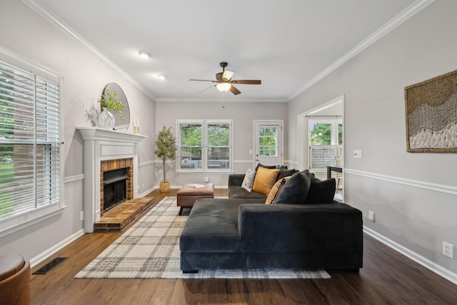 2723 Nottingham Ct, Thompsons Station, TN 37179 - living area with a ceiling fan, wood finished floors, a fireplace, baseboards, and crown molding