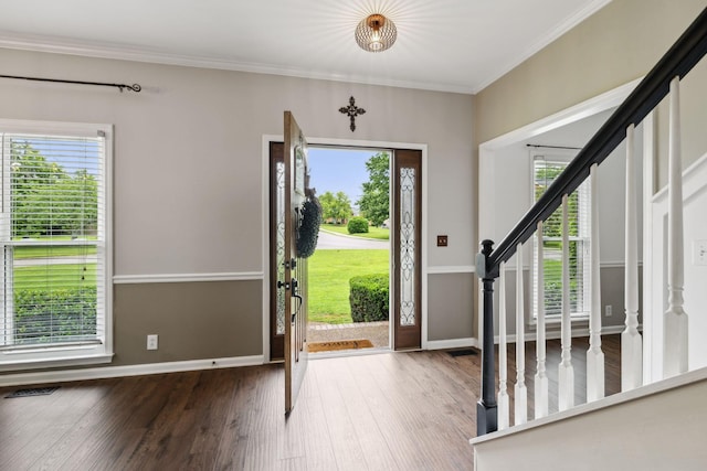 2723 Nottingham Ct, Thompsons Station, TN 37179 - entryway featuring plenty of natural light, wood finished floors, stairs, and crown molding