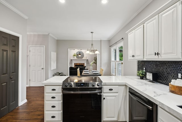 2723 Nottingham Ct, Thompsons Station, TN 37179 - kitchen with stainless steel range with electric cooktop, decorative backsplash, crown molding, light stone counters, and white cabinets