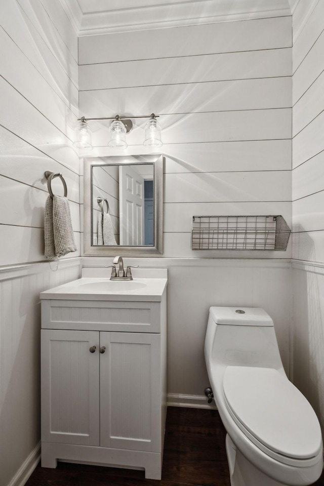 2723 Nottingham Ct, Thompsons Station, TN 37179 - bathroom with vanity, baseboards, ornamental molding, toilet, and wood finished floors
