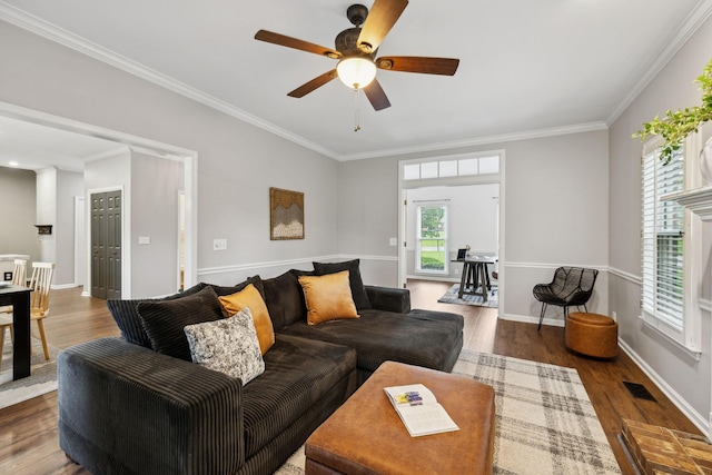 2723 Nottingham Ct, Thompsons Station, TN 37179 - living area with ceiling fan, wood finished floors, ornamental molding, and baseboards