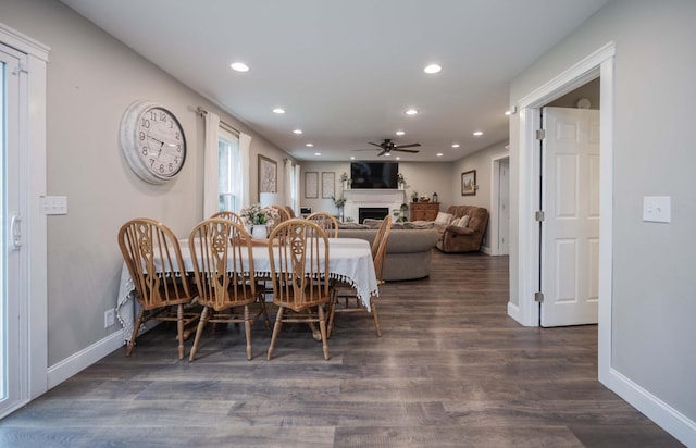 1711 Bridget Dr, Murfreesboro, TN 37129 - dining room featuring recessed lighting, dark wood-type flooring, a ceiling fan, and a fireplace
