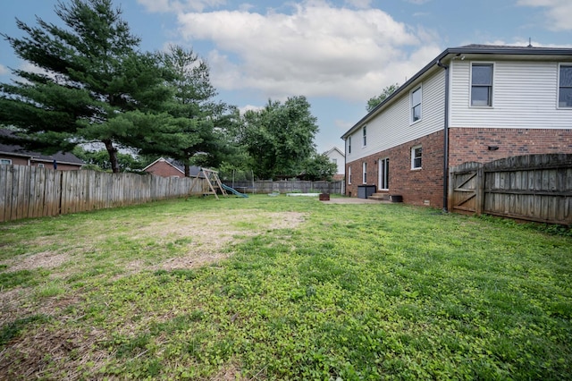 1711 Bridget Dr, Murfreesboro, TN 37129 - fenced backyard featuring a playground, a patio, and entry steps