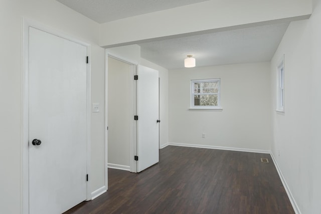 1313 W 46th St, Chattanooga, TN 37409 - basement featuring dark wood-style floors and baseboards