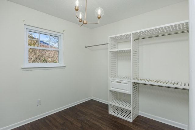 1313 W 46th St, Chattanooga, TN 37409 - spacious closet featuring wood finished floors and a chandelier