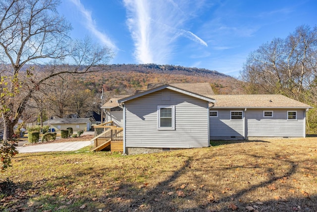 1313 W 46th St, Chattanooga, TN 37409 - back of house with crawl space, stairway, and a yard