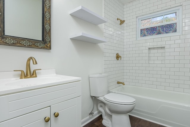 1313 W 46th St, Chattanooga, TN 37409 - full bath featuring toilet, vanity, wood finished floors, and bathtub / shower combination
