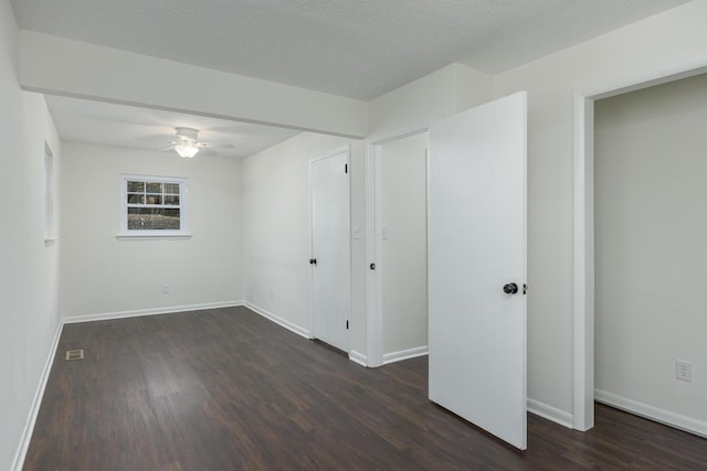 1313 W 46th St, Chattanooga, TN 37409 - unfurnished room featuring dark wood-style floors, a ceiling fan, and baseboards