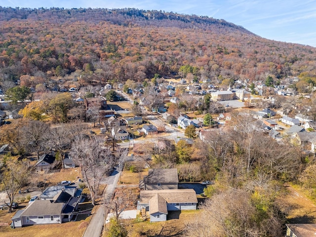 1313 W 46th St, Chattanooga, TN 37409 - aerial view of property and surrounding area featuring a heavily wooded area, mountains, and nearby suburban area