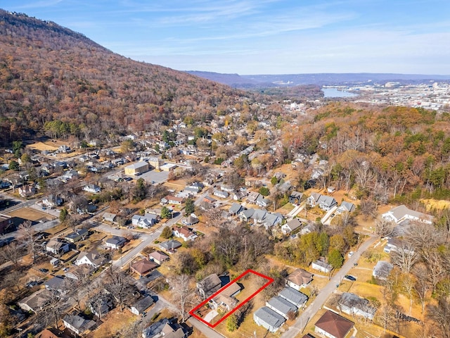 1313 W 46th St, Chattanooga, TN 37409 - aerial view of property's location with property parcel outlined, a mountainous background, and nearby suburban area