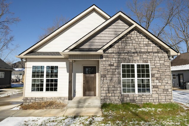 130 Mazie Dr, Lafayette, TN 37083 - view of front of home featuring stone siding and a shingled roof