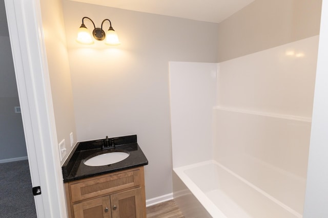 130 Mazie Dr, Lafayette, TN 37083 - full bathroom featuring vanity, shower / tub combination, and baseboards