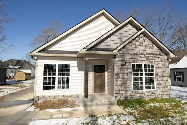 130 Mazie Dr, Lafayette, TN 37083 - view of front of property featuring stone siding and roof with shingles