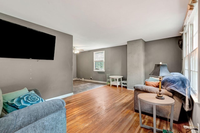 1203 Kingston Springs Rd, Kingston Springs, TN 37082 - living area featuring baseboards, light wood-style flooring, and a ceiling fan