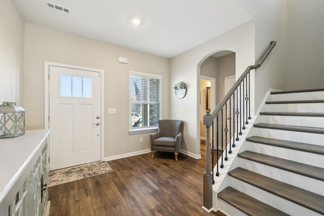4913 Turquoise Ln, Murfreesboro, TN 37129 - foyer with dark wood-style floors, stairway, arched walkways, baseboards, and recessed lighting