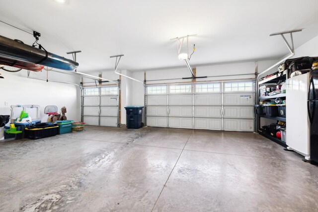 4913 Turquoise Ln, Murfreesboro, TN 37129 - garage with freestanding refrigerator