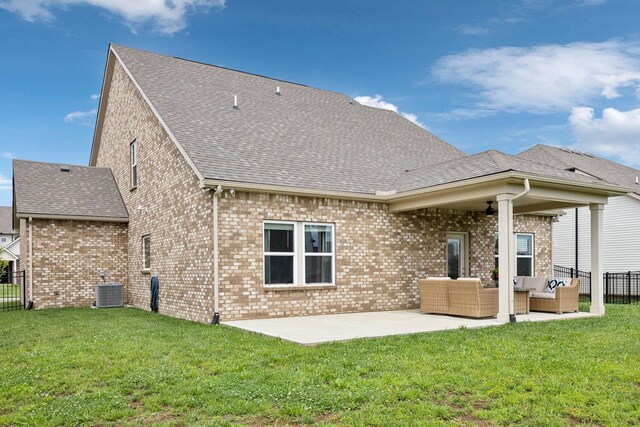 4913 Turquoise Ln, Murfreesboro, TN 37129 - back of property featuring outdoor lounge area, a patio area, a shingled roof, cooling unit, and brick siding