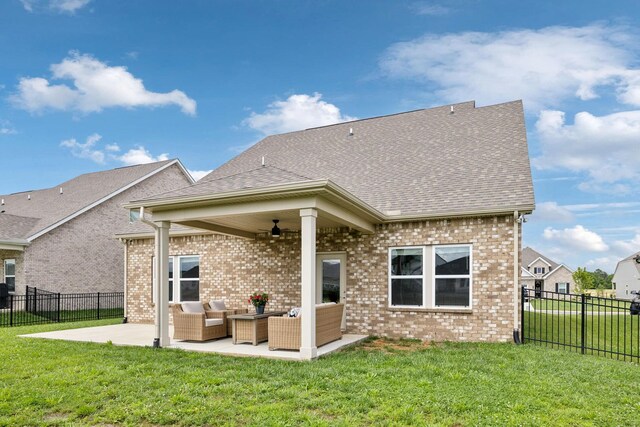 4913 Turquoise Ln, Murfreesboro, TN 37129 - back of property with outdoor lounge area, a patio, ceiling fan, brick siding, and roof with shingles