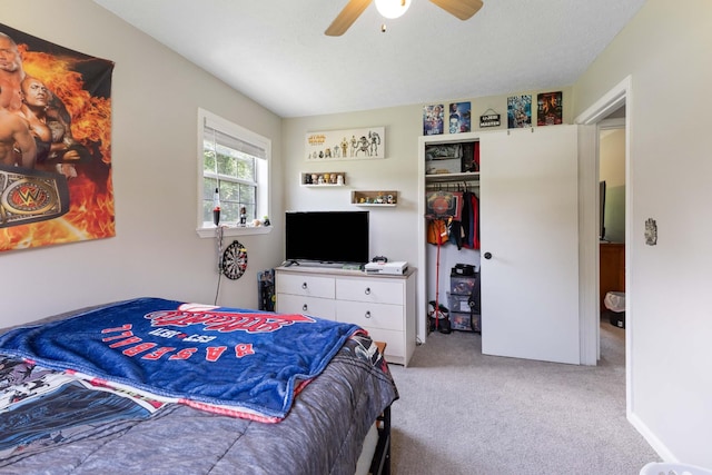 1040 Rebecca Dr, Burns, TN 37029 - bedroom featuring light carpet, a closet, and a ceiling fan