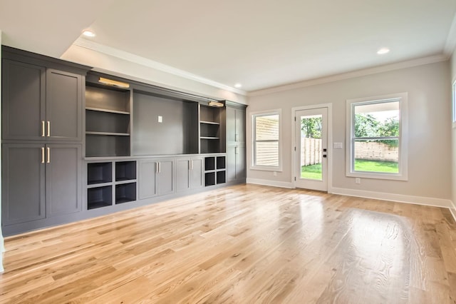 549B Stevenson St, Nashville, TN 37209 - unfurnished living room featuring ornamental molding, light wood-style flooring, baseboards, and recessed lighting