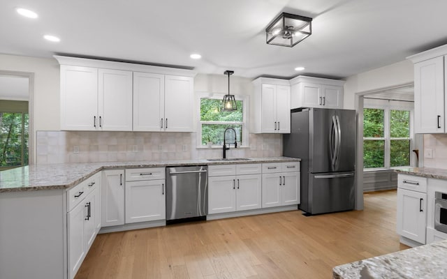 1234 Mountain Brook Cir, Signal Mountain, TN 37377 - kitchen featuring appliances with stainless steel finishes, a sink, white cabinetry, backsplash, and recessed lighting