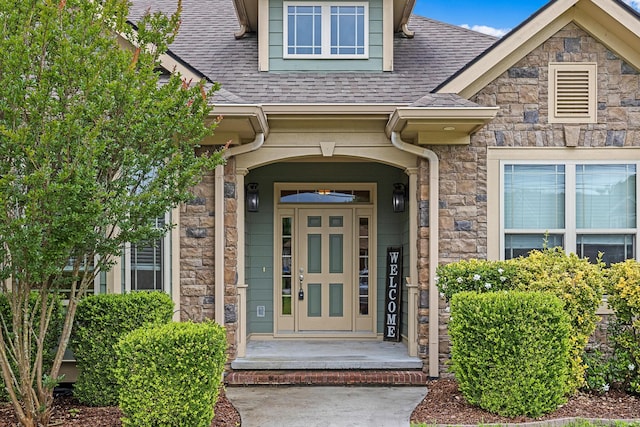 849 Graysville Rd, Chattanooga, TN 37421 - view of exterior entry with stone siding and roof with shingles