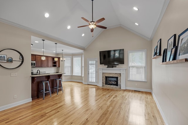 849 Graysville Rd, Chattanooga, TN 37421 - living area featuring ornamental molding, ceiling fan, light wood finished floors, vaulted ceiling, and recessed lighting