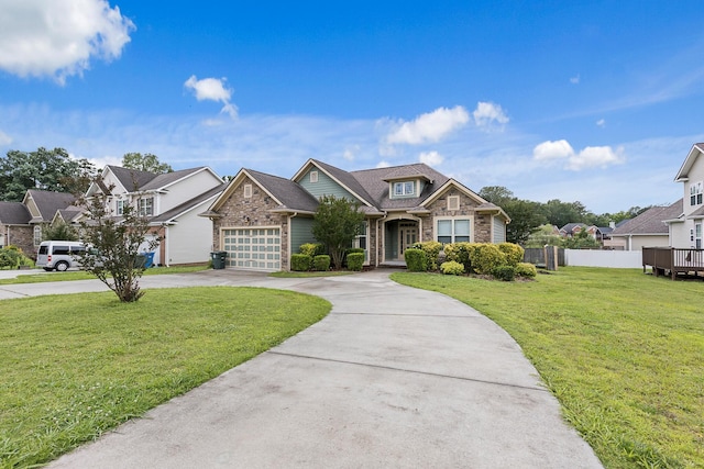 849 Graysville Rd, Chattanooga, TN 37421 - view of front of property featuring concrete driveway, a residential view, a garage, and stone siding