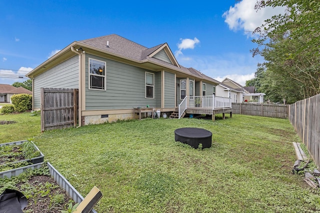 849 Graysville Rd, Chattanooga, TN 37421 - rear view of house with crawl space, a deck, a vegetable garden, and a shingled roof