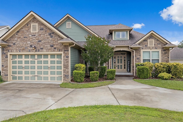 849 Graysville Rd, Chattanooga, TN 37421 - craftsman-style house featuring stone siding, driveway, and a garage