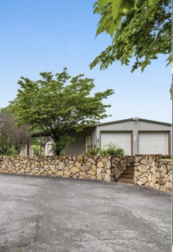 2729 Heights Circle Rd, Greenbrier, TN 37073 - view of front facade with a garage and an outdoor structure