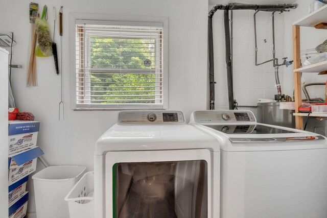 2729 Heights Circle Rd, Greenbrier, TN 37073 - laundry room with washing machine and dryer, plenty of natural light, and water heater